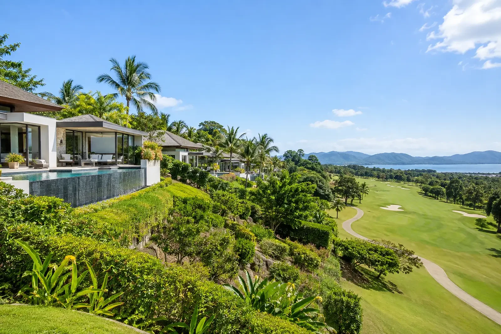 Modern villas on the Black Mountain hillside beside the golf course