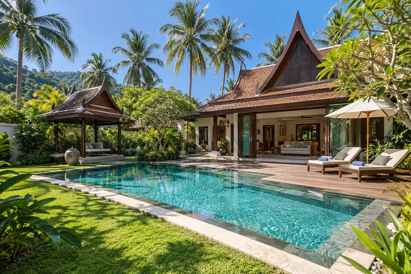 Tropical Thai villa with a private pool surrounded by palm trees in Hua Hin